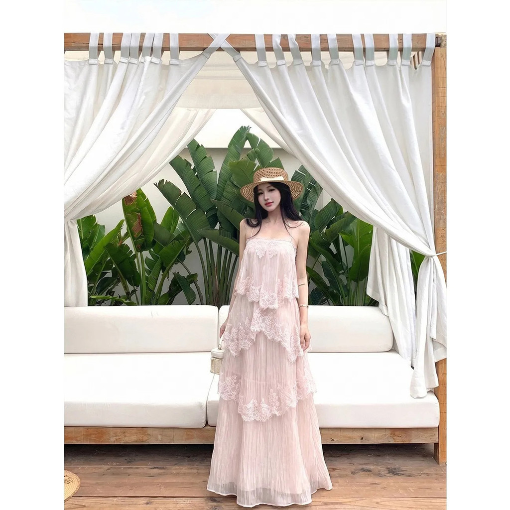 วันหยุดชายทะเลสไตล์อ่อนโยนสีชมพูลูกไม้ผิดปกติสลิงกระโปรงเค้ก 2026 ฤดูร้อนที่ไม่ซ้ํากันที่สวยงามหลวมกระโปรงยาว