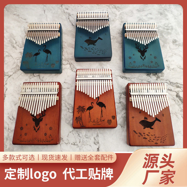ชกมวยไฟฟ้า เป้าชกมวย เปียโนนิ้วหัวแม่มือ 17-Tone Kalimba เริ่มต้นแบบพกพา Kalimba เปียโน 21-Tone เปีย