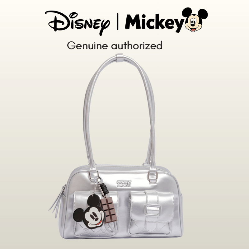 กระเป๋า Disney ของแท้ กระเป๋าถือผู้หญิง หนัง PU มีให้เลือก 6 สี (ชมพู ครีม น้ำตาล ดำ แดง เงิน) มีช่องด้านหน้า ใส่ของสะดวก มีจี้ Mickey น่ารัก ใช้ได้ทุกวัน ใส่โทรศัพท์ เครื่องสำอาง ได้เยอะ ไปทำงาน ไปช้อปปิ้ง