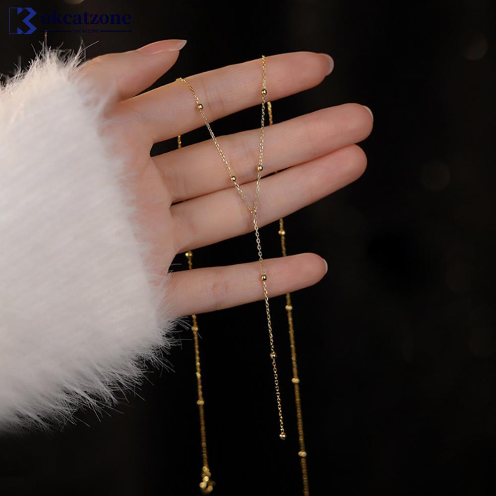 OKCATZONE Minimalist รอบลูกปัดพู่สร้อยคอยาว Clavicle Chain ผู้หญิง Elegant ยาวจี้เครื่องประดับ M4R4