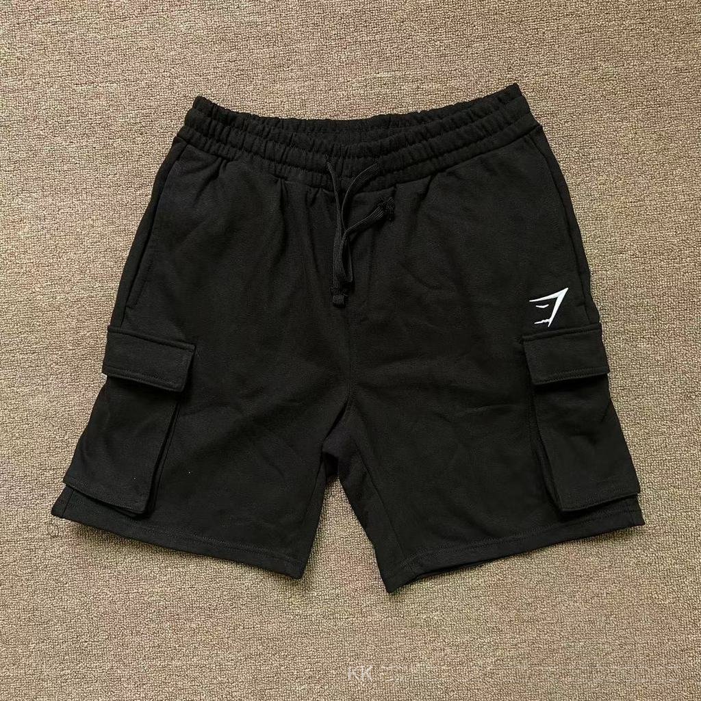 กางเกงขาสั้นเทอร์รี่ Gymshark หนามีกระเป๋า สำหรับการฝึกฝนและการออกกำลังกายของผู้ชาย