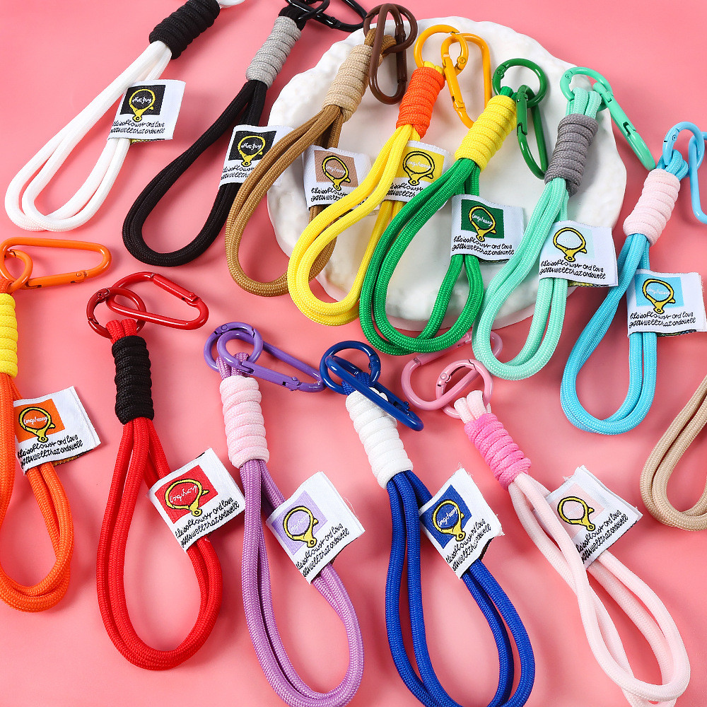 ใหม่สร้างสรรค์สีพวงกุญแจไนลอนแขวนเชือกปีนเขาหัวเข็มขัด ทําเอง ตุ๊กตาจี้โทรศัพท์มือถือโซ่กระเป๋าแขวนเชือก