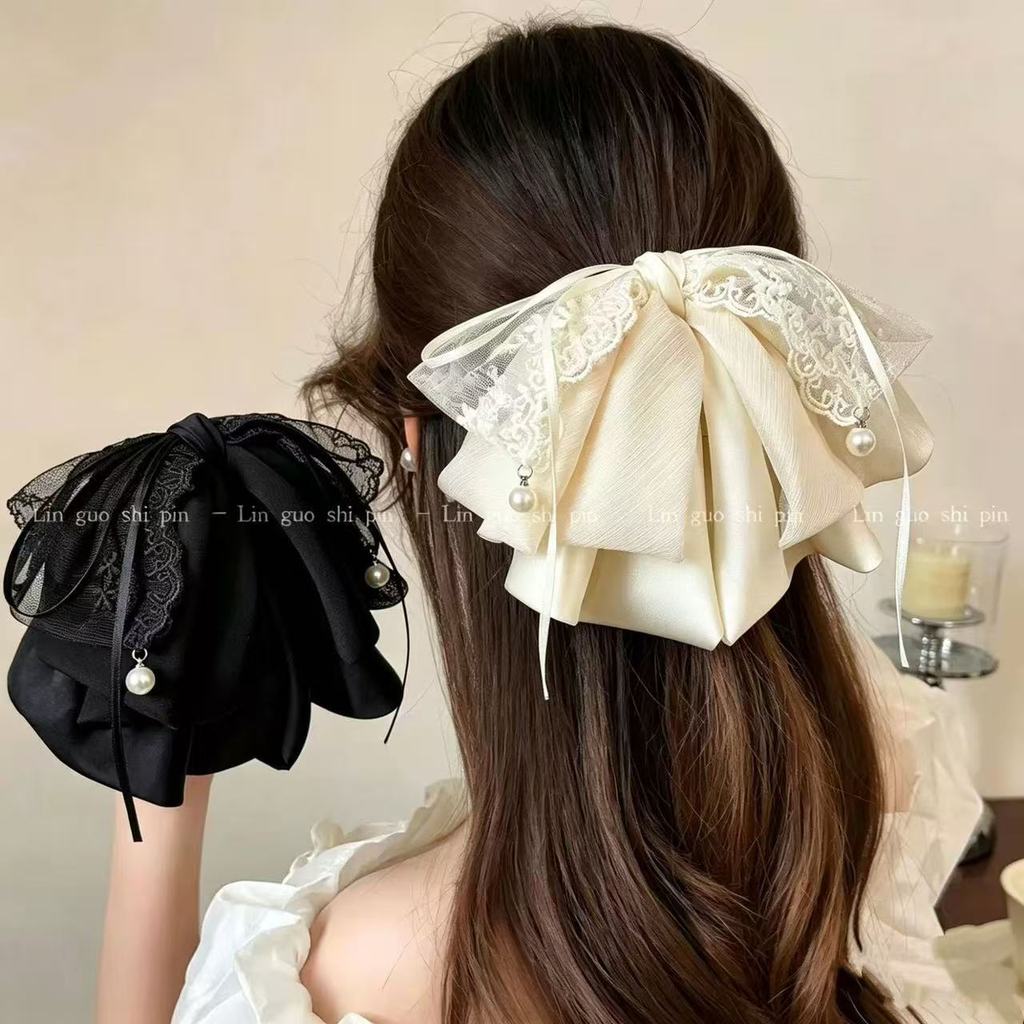 Butterfly bow ponytail clip