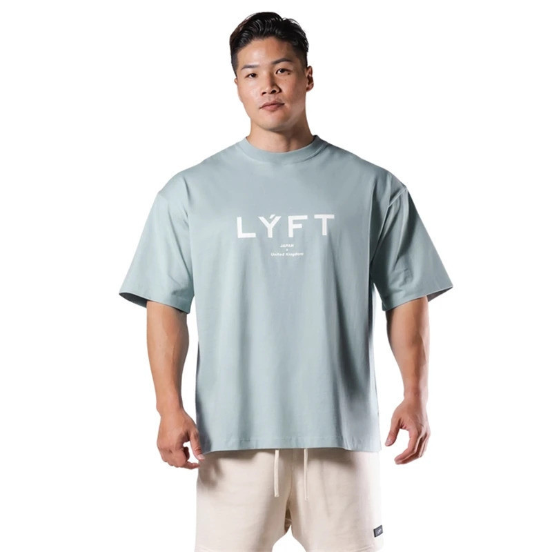 LYFT เสื้อยืดแขนสั้นสำหรับผู้ชาย เหมาะสำหรับการออกกำลังกาย ทรงหลวม ระบายอากาศได้ดี เหมาะสำหรับการฝึก