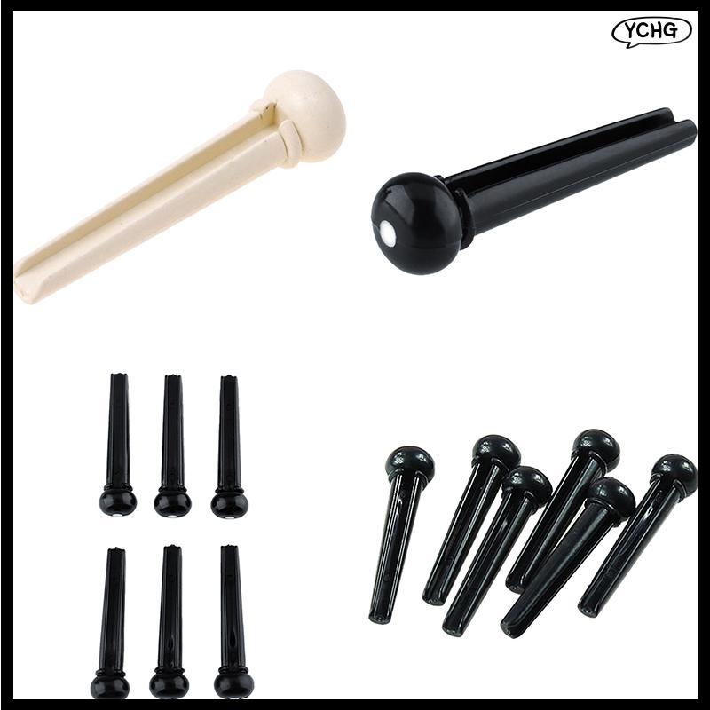 YCG ชุด 6 ชิ้น Bla Ebony Bridge Pins พร้อมจุดเชลล์สําหรับกีตาร์อะคูสติกคุณภาพ
6 ชิ้น Ebony Bridge Pi