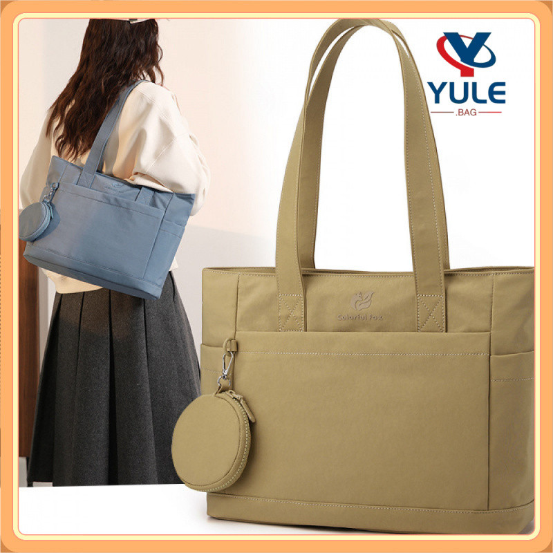 YULE กระเป๋าโท้ตไนลอนกันน้ำ สำหรับผู้หญิง ดีไซน์มินิมอลสไตล์ญี่ปุ่น จุของได้เยอะ หลายช่อง น้ำหนักเบา 0.37 กก. สะพายไหล่/ถือได้ แถมกระเป๋าใส่เหรียญ ใช้ได้ทั้งไปเรียน ทำงาน และท่องเที่ยว