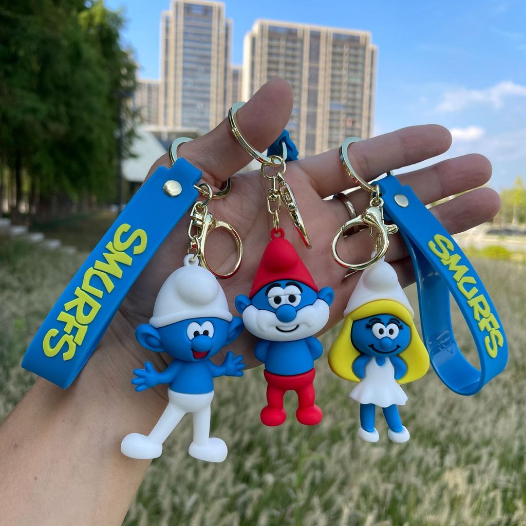 การ์ตูน Smurf พวงกุญแจอะนิเมะ Smurf พ่อ Smurfs คู่กระเป๋าจี้ตุ๊กตารถของขวัญเล็กๆ DL20251029
