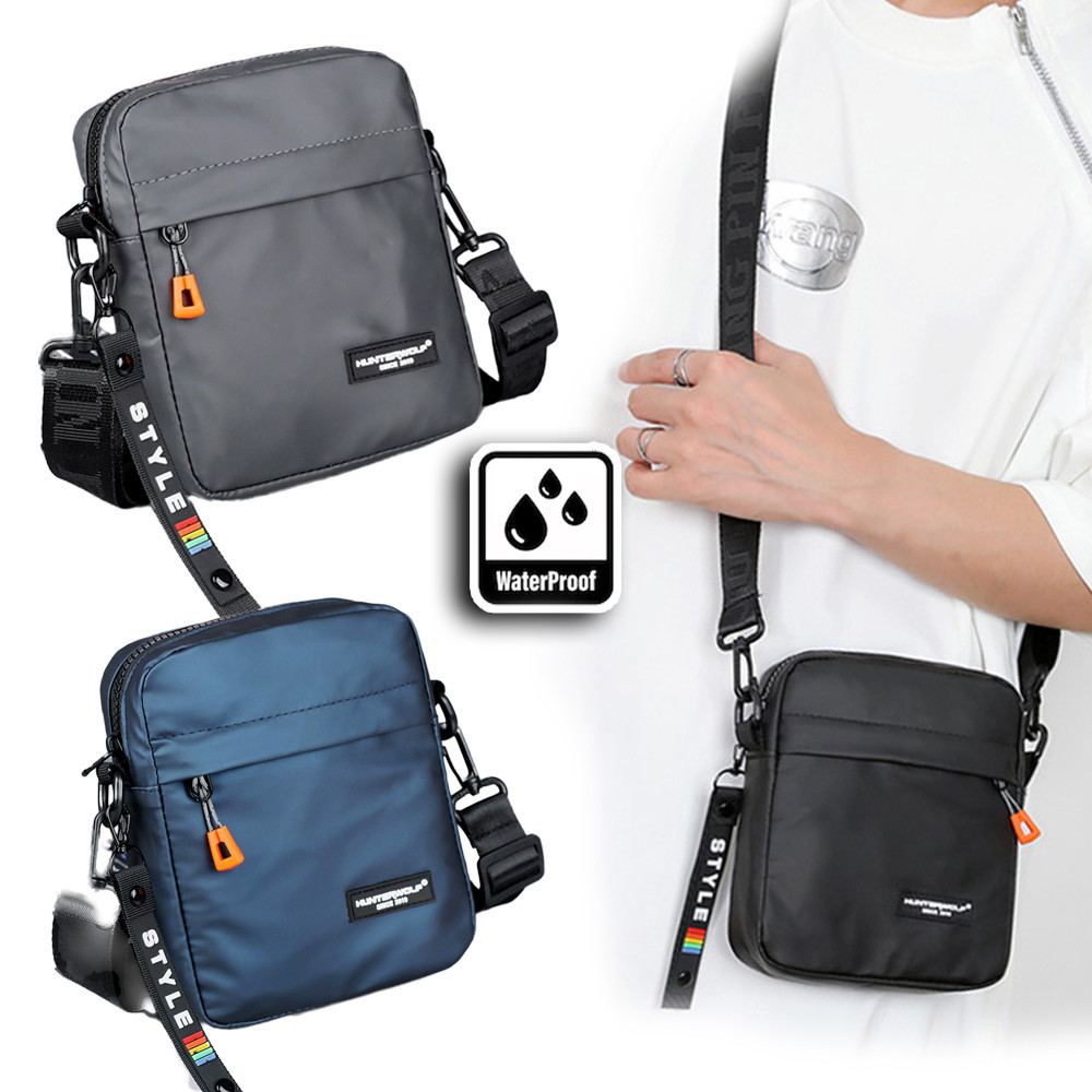 (w293) กระเป๋าสะพายข้างชายหญิง ผ้าใบกันน้ำ แถมห้อยป้ายจี้สีส้มSTYLE