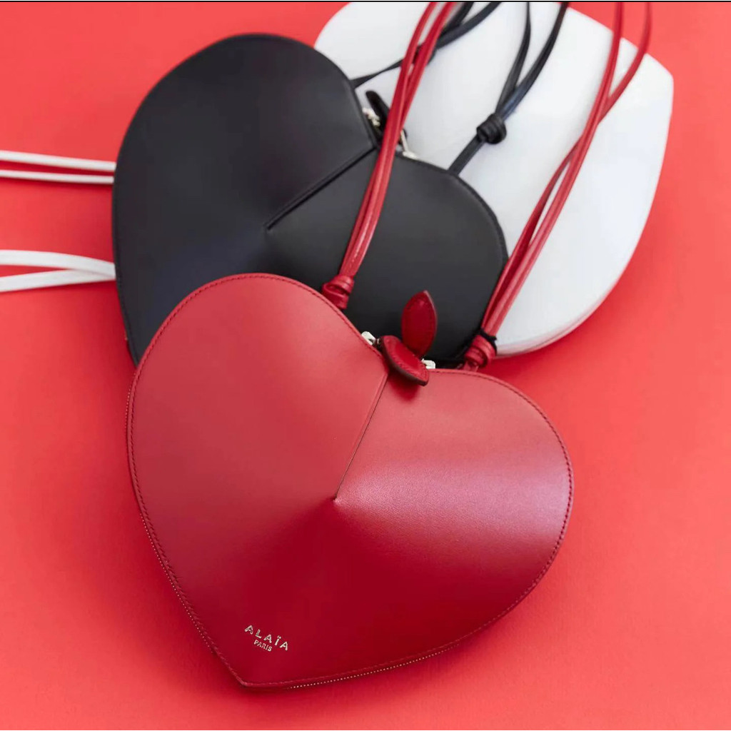 กระเป๋า Alaia สีพีช ทรงหัวใจ พกพาสะดวก หนังแท้ เข้าได้กับทุกสไตล์