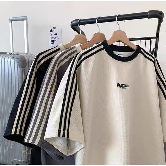 Chaistyle เสื้อยืดผู้ชาย ผ้าวาฟเฟิลด์ สไตล์ลายทาง ลาเกรน แขนสั้นแบบหลวมลำลอง เสื้อฤดูร้อน