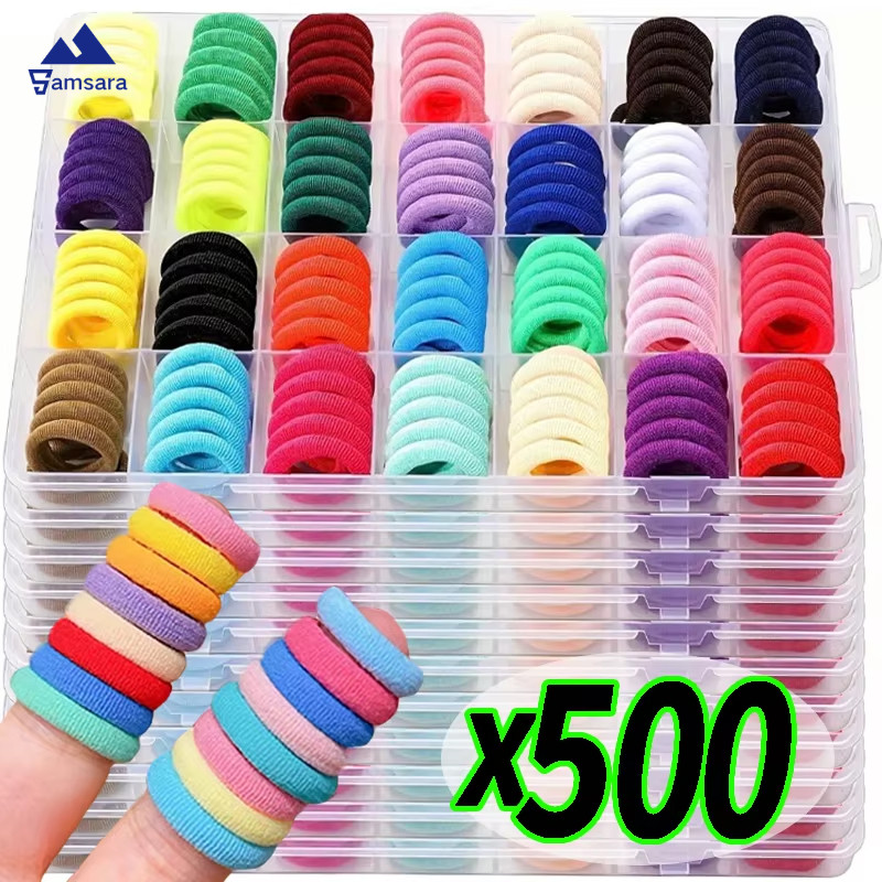 ยางรัดผมเด็ก 20 มม. สีหลากหลาย ยืดหยุ่น สำหรับทำ ponytail และการใช้งานทั่วไป ปลอดภัยต่อเส้นผม มาในแพคเกจขนาด 100, 300 หรือ 500 ชิ้น