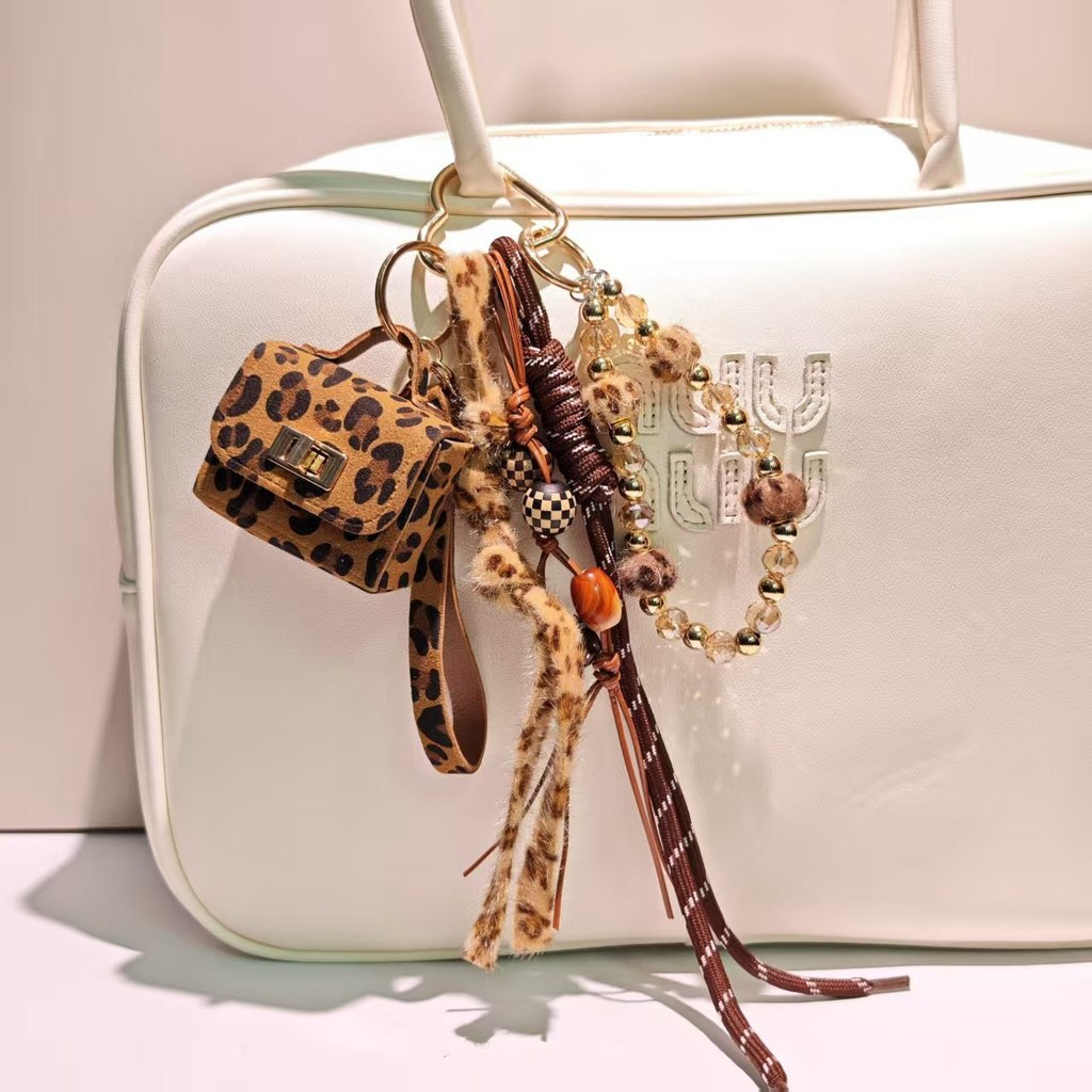 【Ready Stock】 Autumn and Winter New Miu Leopard Print Bag Key Chain Crystal String Beads Braided Rop