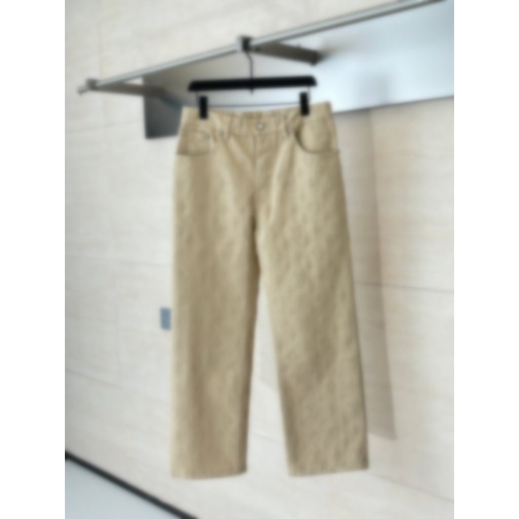 XZ3F 1v Pharrell Williams' embossed denim pants with all-over print, unisex style