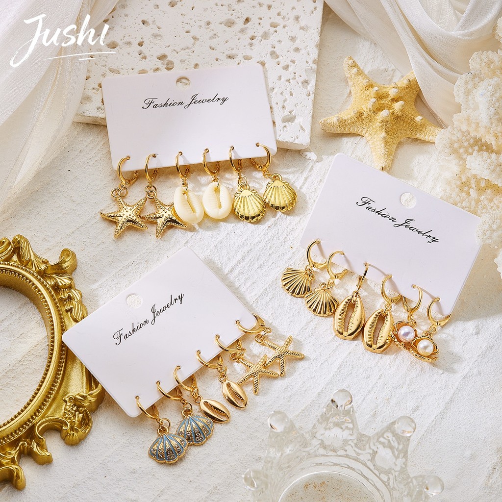 JUSHI Pearl Rhinestone ปลาดาวสร้อยคอต่างหูชุด Y2K Beach Party วันหยุดเครื่องประดับอินเทรนด์ Aesthetic Hip Hop ของขวัญสําหรับเธอ