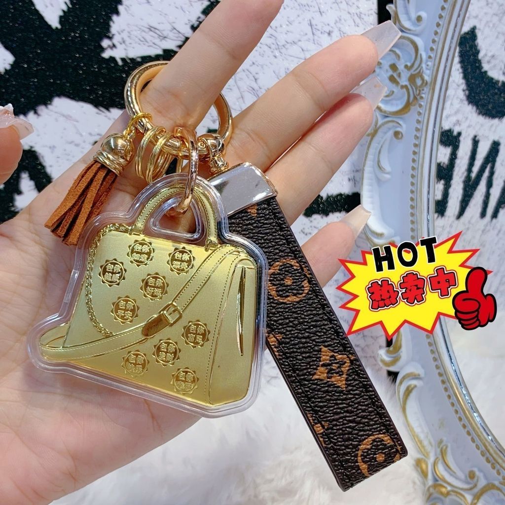 อารมณ์/ทองคําบริสุทธิ์999กระเป๋าหนังพวงกุญแจจี้กระเป๋าคุณรวยกระเป๋าโทรศัพท์มือถือจี้แฟนของขวัญปีใหม่