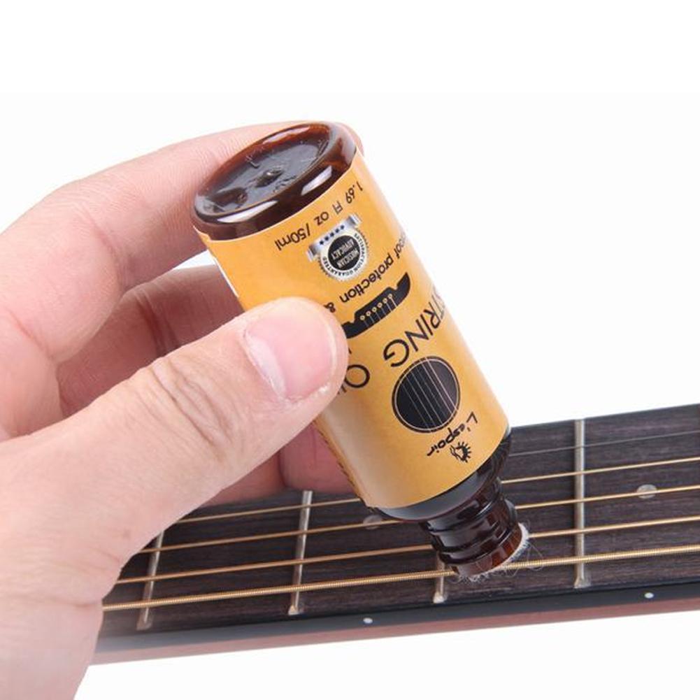 50ml น้ํามันพยาบาลกีตาร์ Fingerboard น้ํามันมะนาว String Oil สําหรับกีตาร์ String Care V2u4