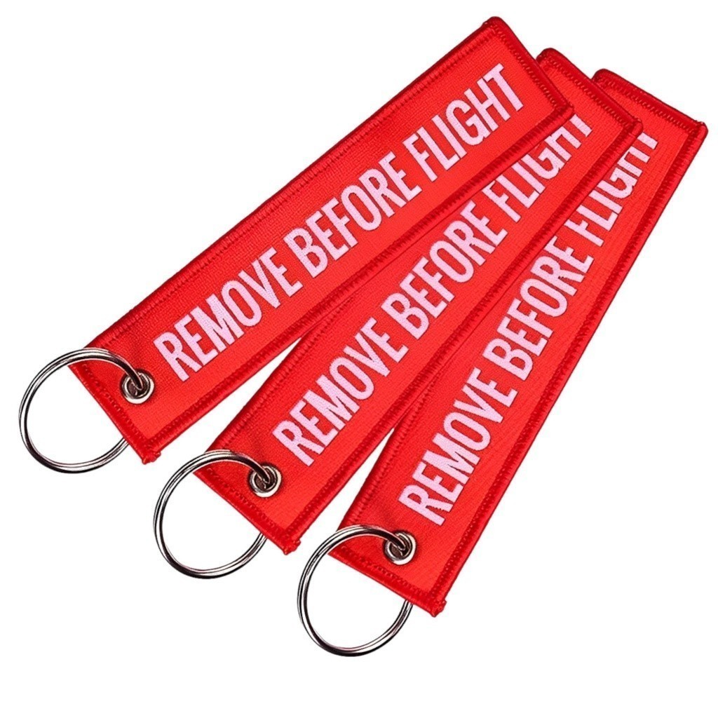 REMOVE BEFORE FLIGHT LUGGAGE TAG