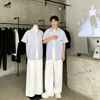 DAW เสื้อเชิ้ตลายทาง สีฟ้า เสื้อเชิ้ตแขนสั้น กระดุมแถวเดียว มีกระเป๋า สไตล์เกาหลี สบายๆ หลวมสบาย บาง ฤดูร้อน unisex