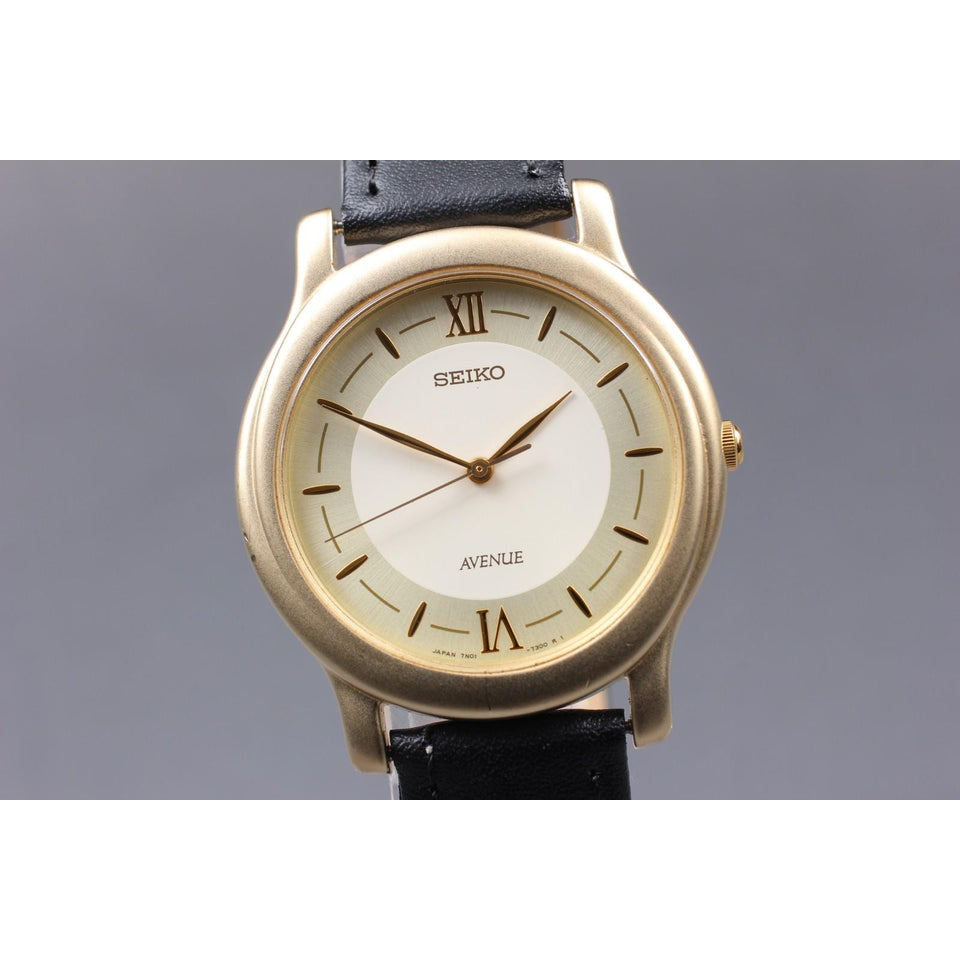 Vintage 1993 [near mint] seiko avenue 7n01-7090 gold roman 35mm qz men's watch