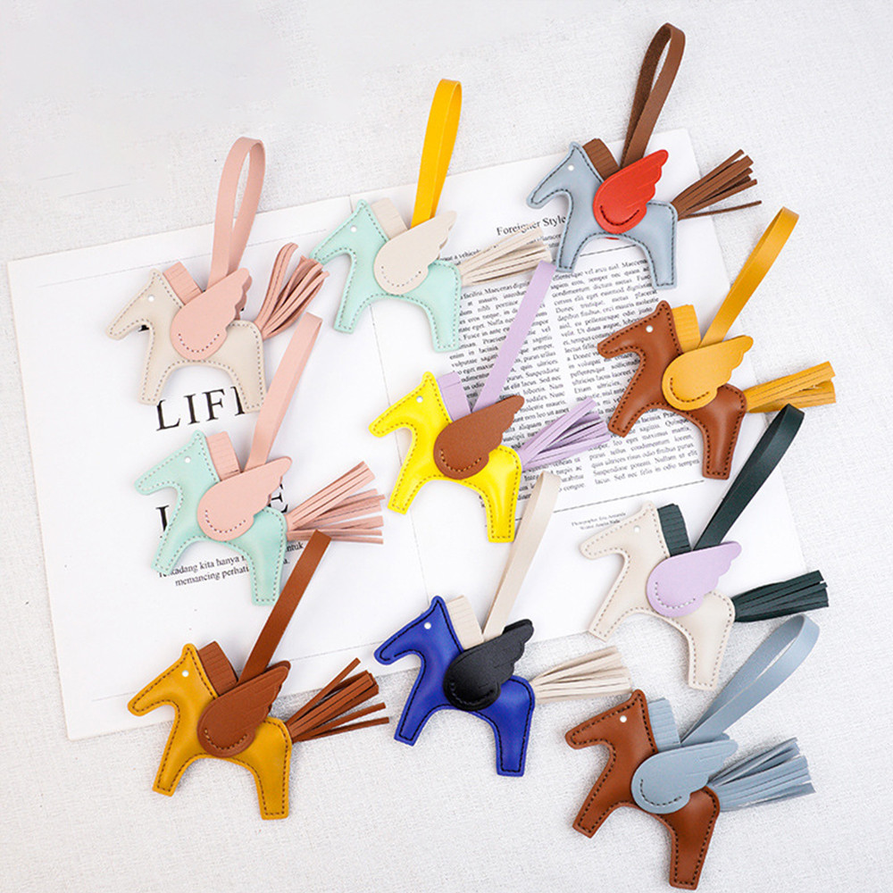 ตลก Flying Pony Key แหวนน่ารักสีสัน Pu หนังม้าพวงกุญแจการ์ตูน Pegasus Key Holder กระเป๋าถือจี้