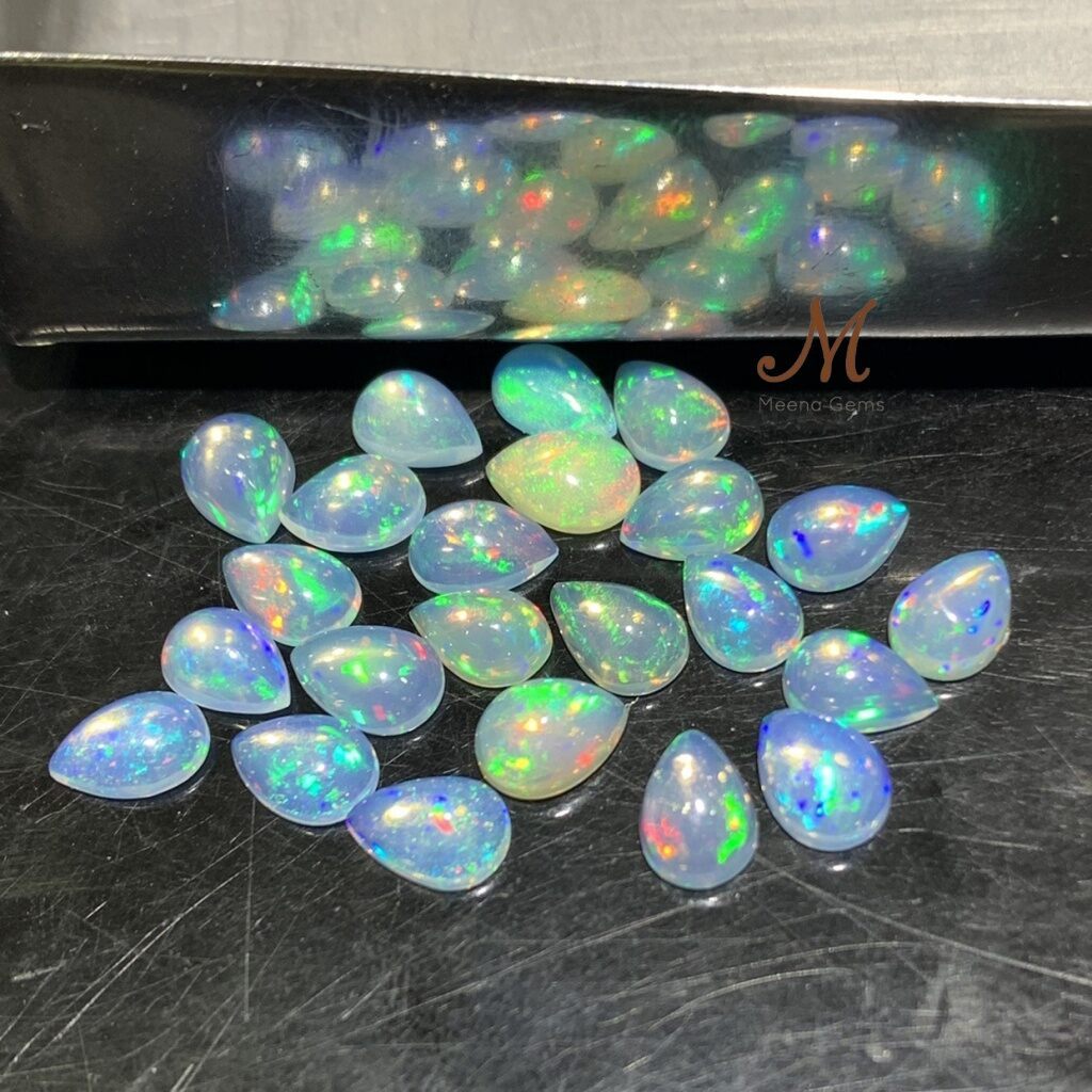 พลอยโอปอลแท้ทรงหยดน้ำ Opal Loosegem เกรดท็อปๆ พลอยดิบ 1เม็ด พลอยแท้ธรรมชาติ ไม่มีการปรับปรุงคุณภาพ  หิน หินแท้ โอปอล