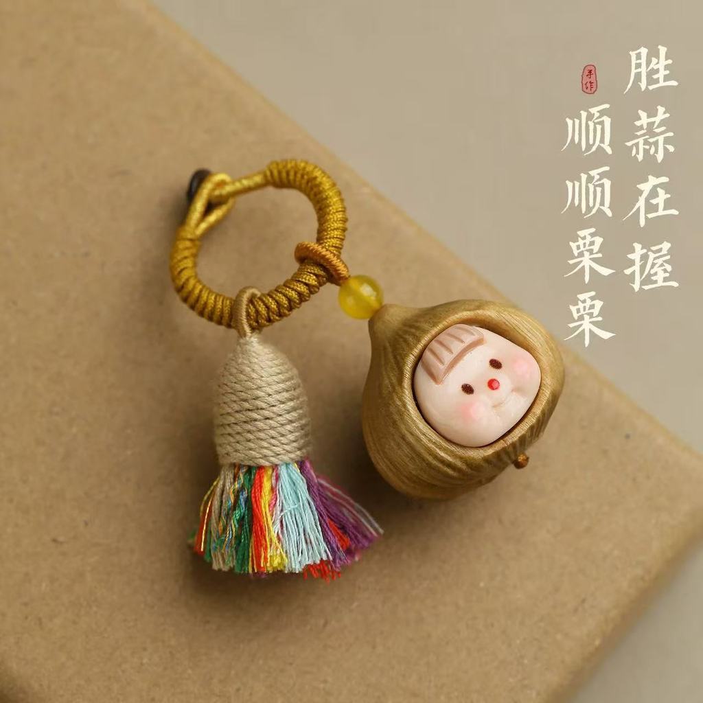 น่ารักถั่วตุ๊กตาพวงกุญแจถุงโชคดีเสน่ห์พู่ที่มีสีสันจี้สร้างสรรค์ของขวัญสําหรับผู้หญิงกุญแจรถตกแต่ง
