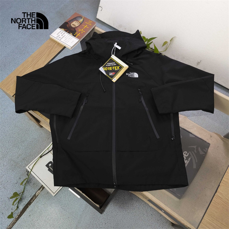 The North Face เสื้อแจ็คเก็ตกันลมมีฮู้ดผู้ชายกันน้ํากลางแจ้ง