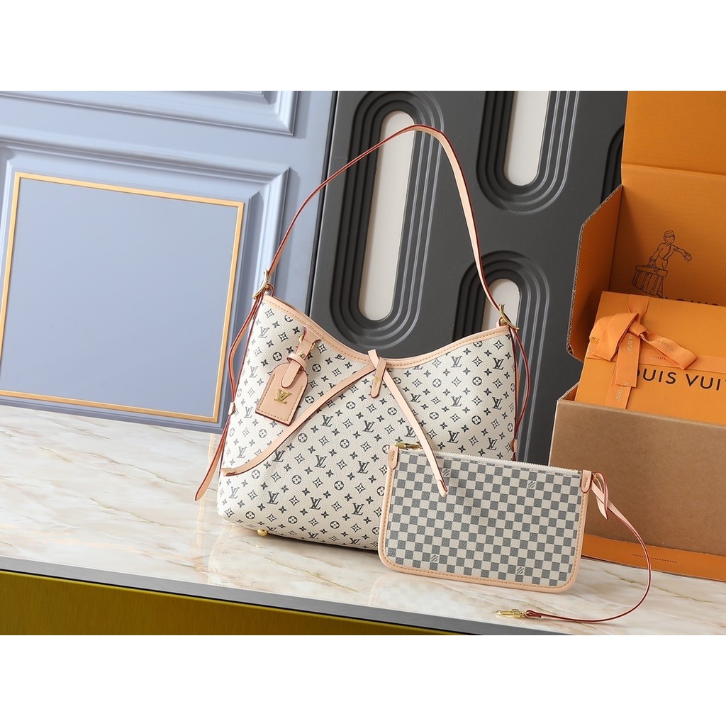 กระเป๋าถือขนาดเล็ก Mono Empreinte ทำจากหนัง Monogram ขนาด 29 x 24 x 12 ซม.