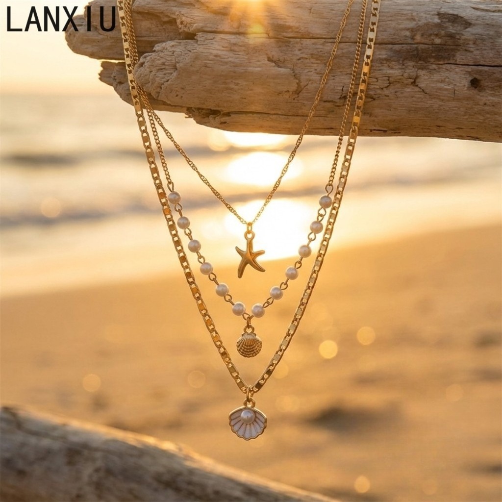LANXIU Boho สร้อยคอมากกว่าระดับพร้อม charm เปลือกหอยและไข่มุก สไตล์ชิกสำหรับทะเล เหมาะเป็นของขวัญสำหรับผู้หญิง