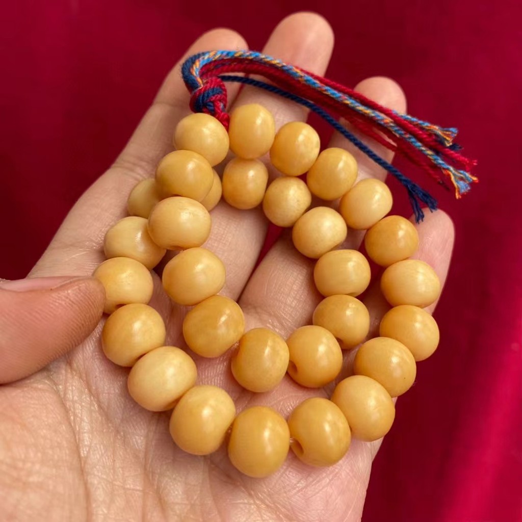 Wenwan Camel Bone Beef Bone Chicken Oil สร้อยข้อมือสีเหลืองลูกปัดมือถือพร้อมลูกปัดคอน้ํามันไก่ Lutei