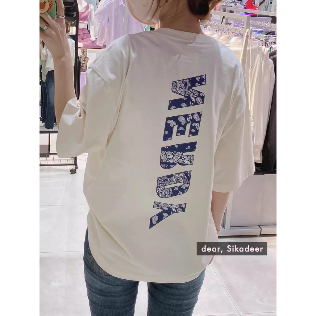 เสื้อยืดพิมพ์ลายตัวอักษร NERDY