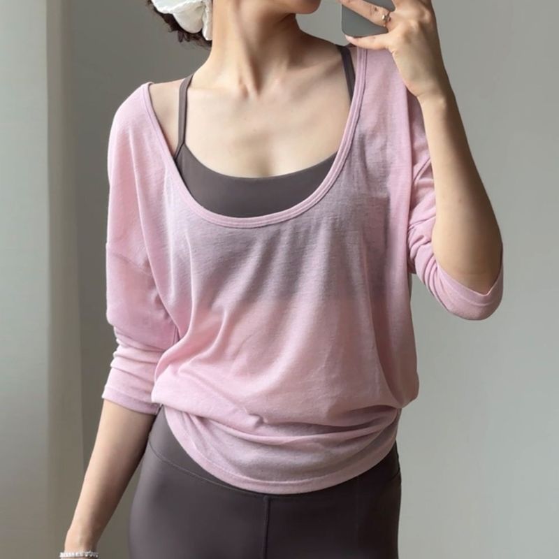 เสื้อยืดพิลาทิสยืดหยุ่นแขนยาวสำหรับฤดูฝนถึงหน้าหนาว สไตล์หลวม เหมาะสำหรับโยคะและออกกำลังกาย มีฟังก์ชันเรืองแสง