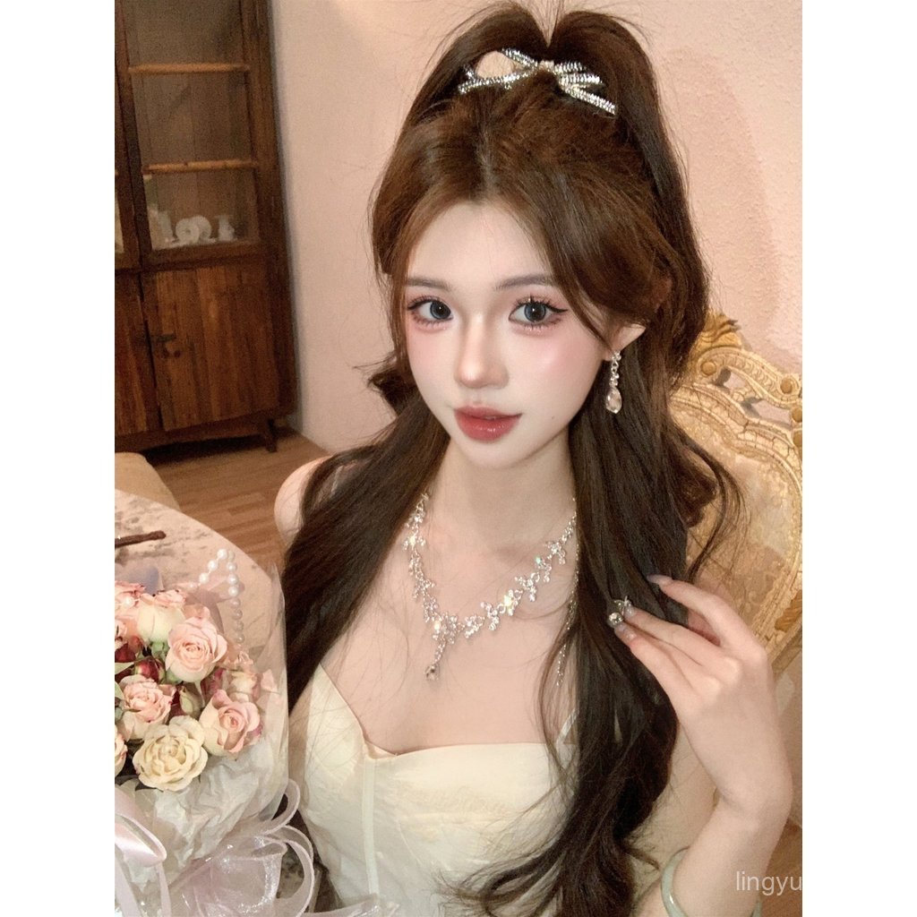 ลูกสาวสร้อยคอหยดน้ําอุปกรณ์เสริมหญิงต่างหูชุดชุดราตรีเจ้าสาวกระดูกไหปลาร้าโซ่แสงหรูหราวันเกิดโอ้อวด 