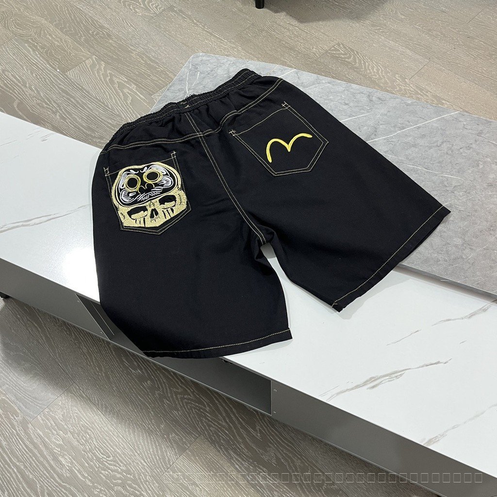 2026 new evisu กางเกงขาสั้นผ้ายีนส์ปักเย็บปะต่อหัก