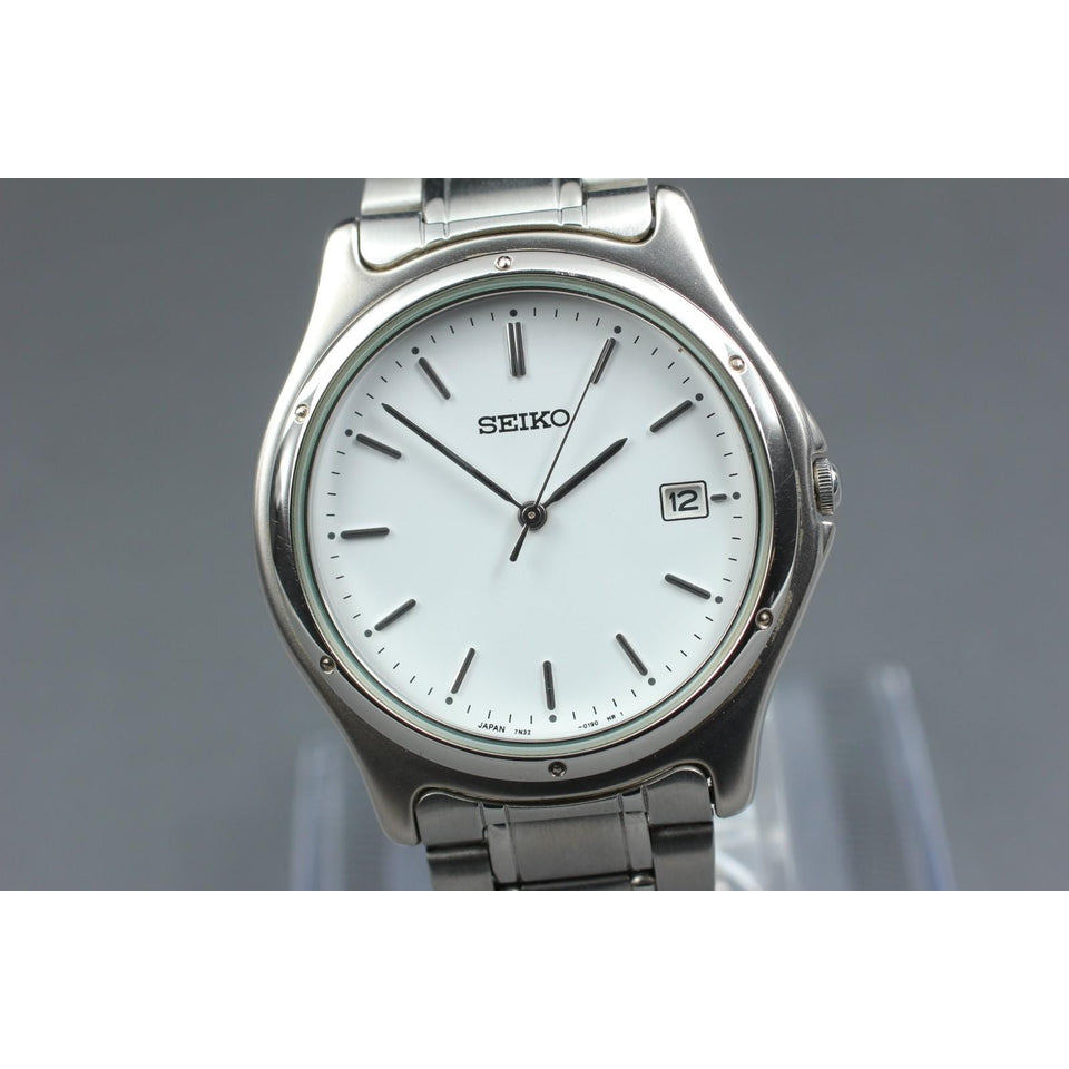 Vintage1996 [n mint] seiko 7n32-0150 silver date white round 36mm qz men's watch