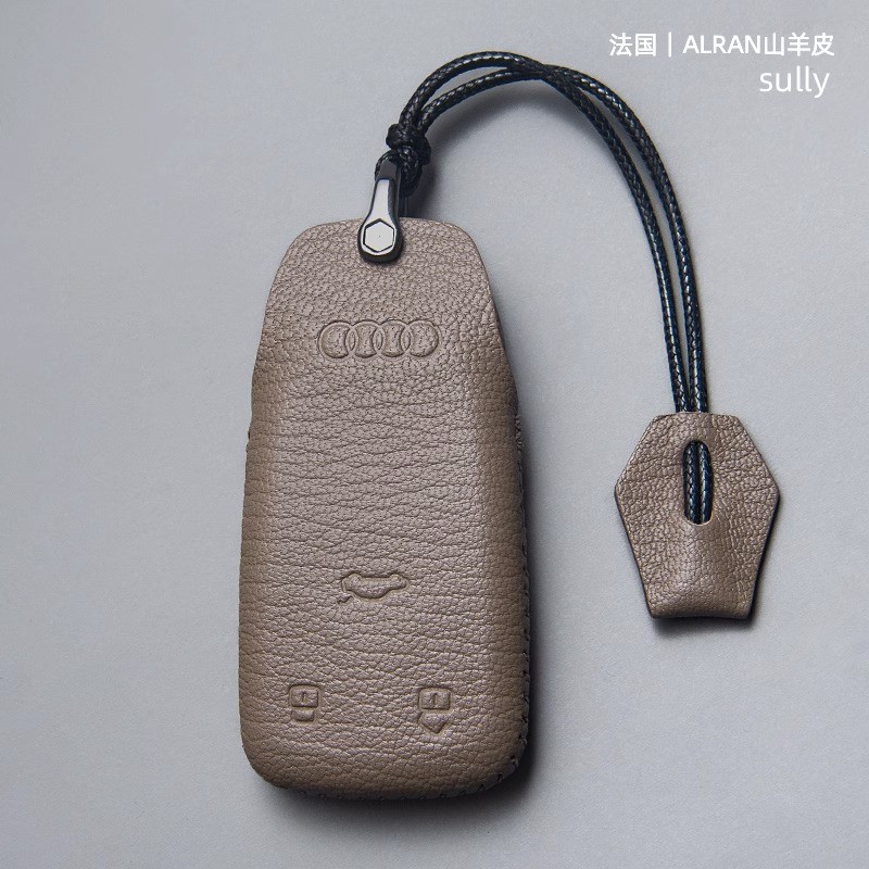 เหมาะสําหรับ Audi Key Cover A4L/A6L/A3/A7/A8/Q5L/S4/A5/Q7/Q8 รถหญิงกระเป๋าหนังแท้ OY