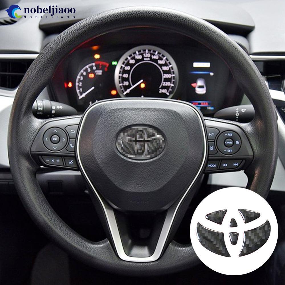 NOBELJIAOO 1 PC พวงมาลัยรถสติกเกอร์ด้านในคาร์บอนไฟเบอร์ Trims สําหรับ Toyota ภายใน Decals อุปกรณ์เสร