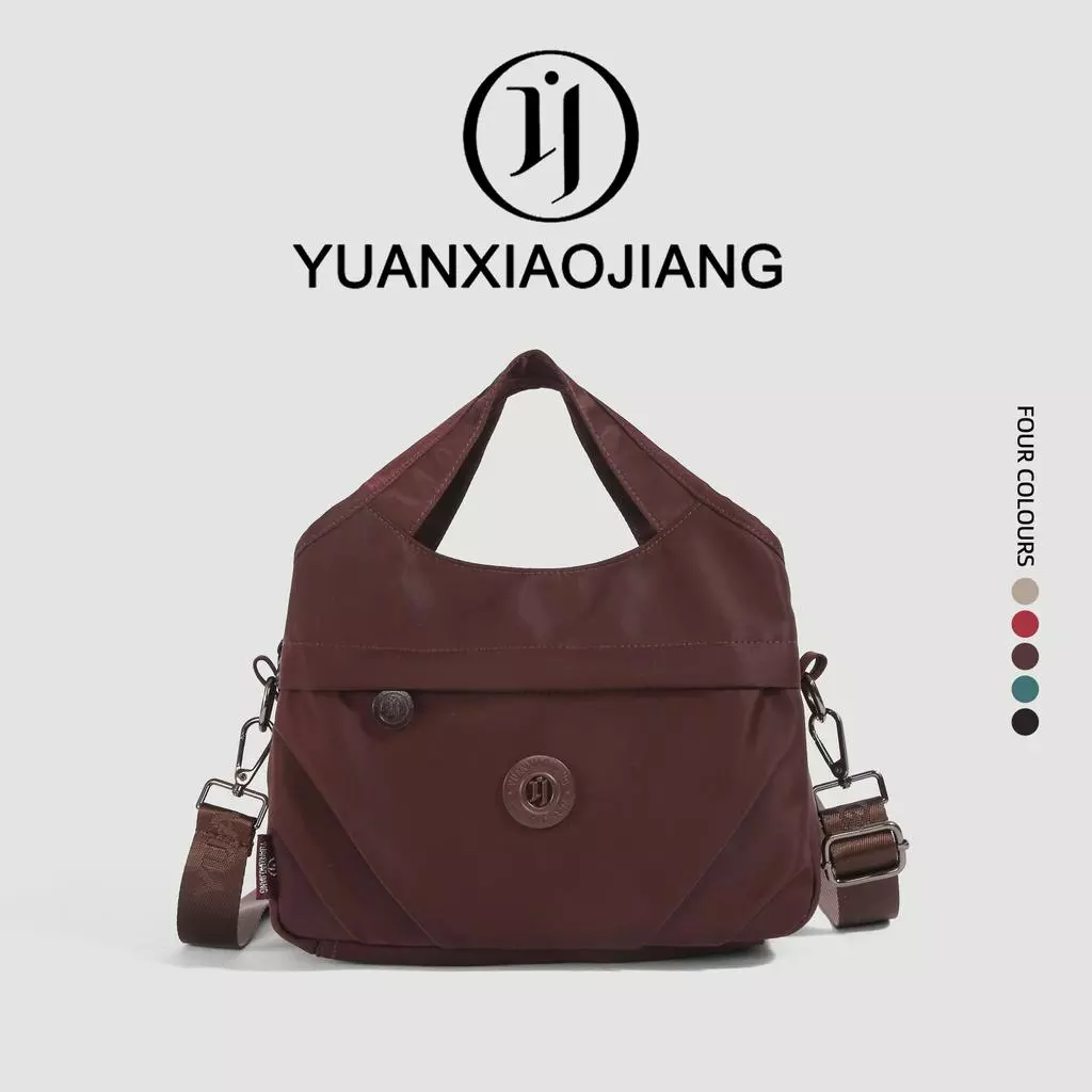 YUANXIAOJIANG กระเป๋าสะพายเฉียง รุ่นใหม่ ดีไซน์มัลติฟังก์ชัน ผ้าไนลอนกันน้ำ ถือได้สะพายไหล่ได้ แฟชั่นทันสมัย