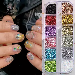 [maybeauty] 12 กริดผสม Star Heart Nail Glitter 1 มม.Star เลื่อมเล็บ DIY สีสันประกายเล็บ Charms อุปกรณ์ตกแต่งเล็บ {TH}