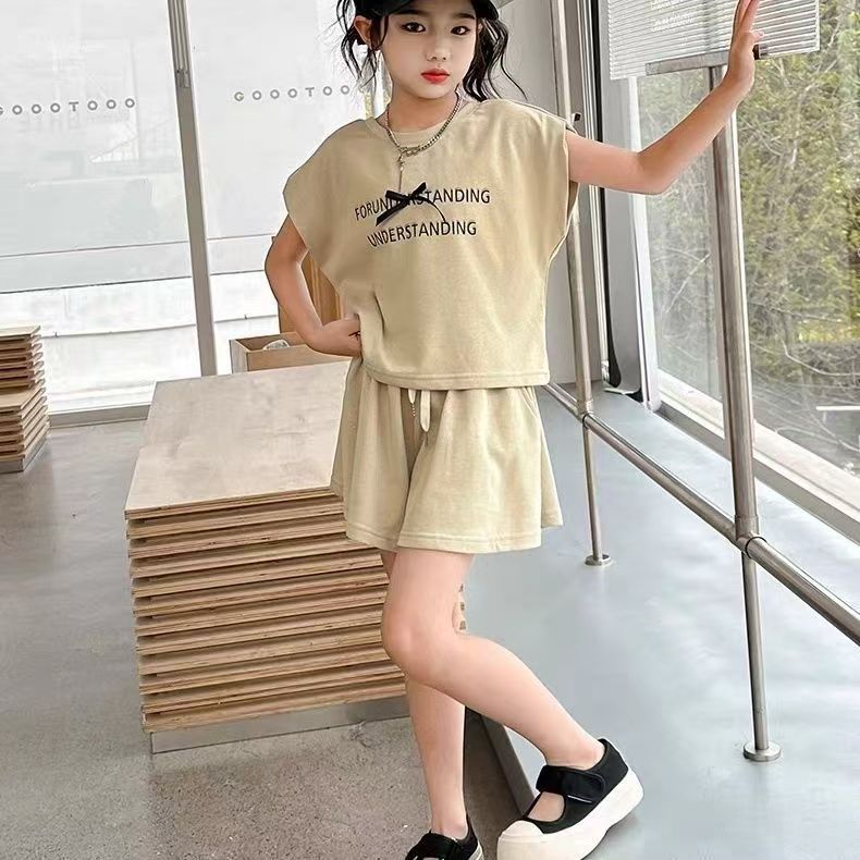 สาวฤดูร้อนแขนสั้นชุดผ้าฝ้ายคลาสกลําลองแฟชั่นกลางเด็กใหญ่กีฬากางเกงขาสั้นเวอร์ชั่นเกาหลีชุดสองชิ้น TL