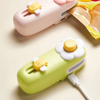 เครื่องซีลถุง 2in1 เครื่องซีลปากถุง เครื่องซีลถุงพลาสติก แบบพกพา มีใบมีดตัด แม่เหล็กติดตู้เย็น ถนอมอาหาร