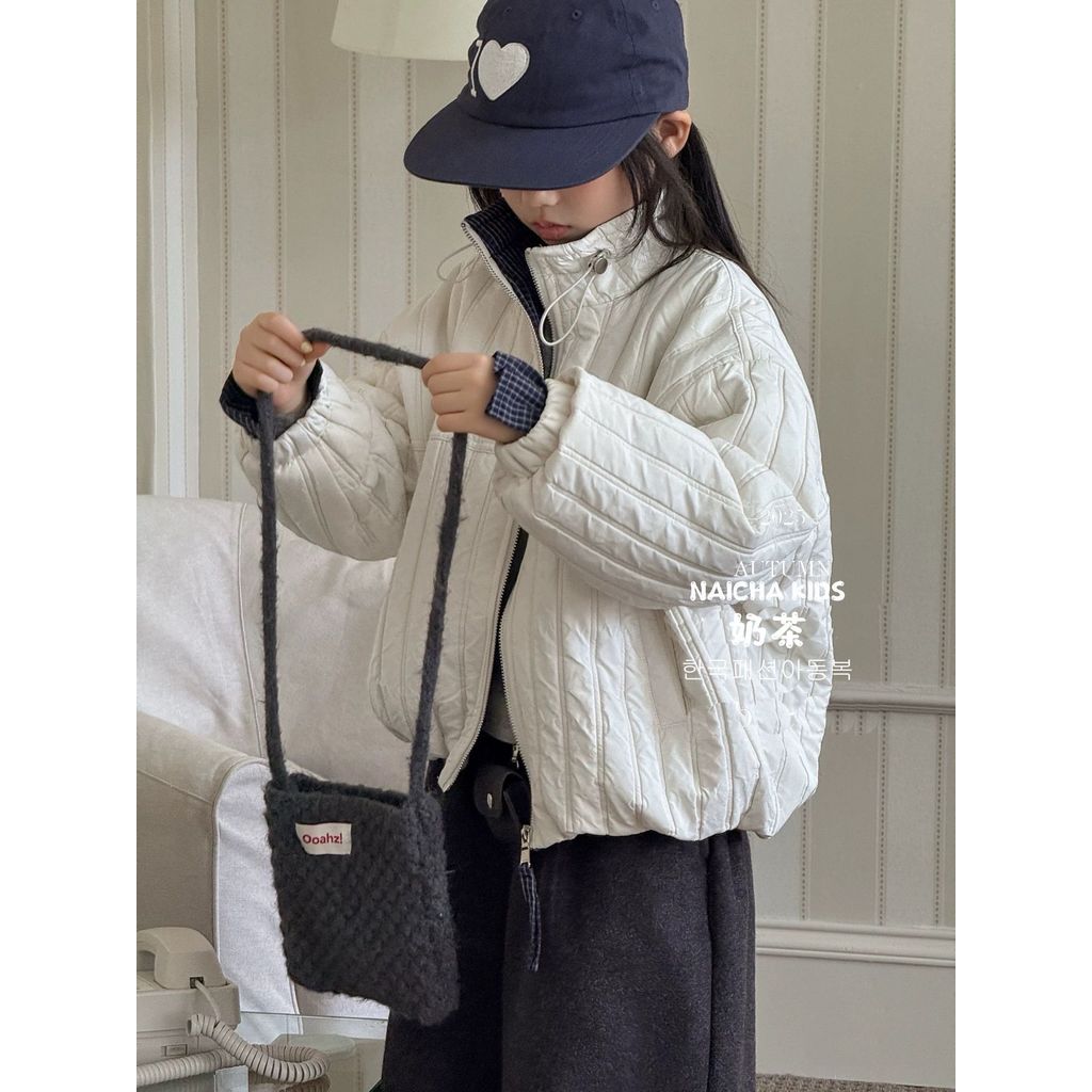 ปลาค็อด 2026เวอร์ชั่นเกาหลีเสื้อผ้าเด็ก2025ฤดูใบไม้ร่วงฤดูหนาวรูปแบบใหม่เด็กลายสก๊อตยืนขึ้นปกผ้านวมเ