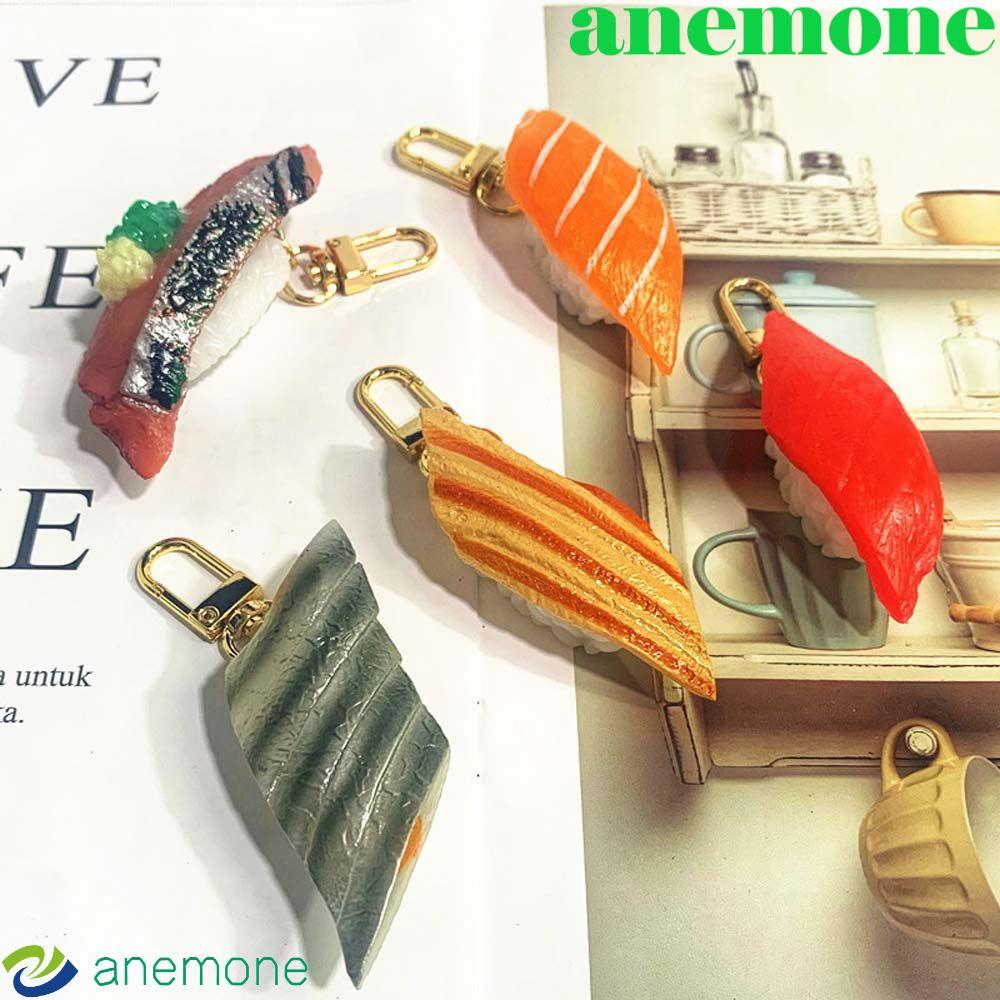ANEMONE จําลองซูชิพวงกุญแจบุคลิกภาพน่ารักญี่ปุ่นอาหารกระเป๋าอาหารรุ่นจี้ปลาแซลมอน Sea Urchin ซูชิกระ