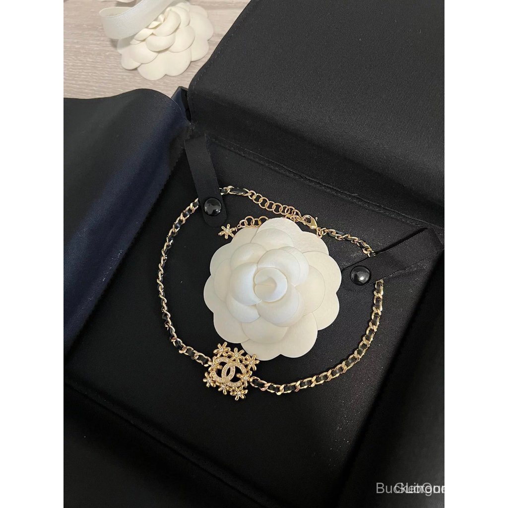 Chanel_perfume_small_gold_square_leather_chain_choker