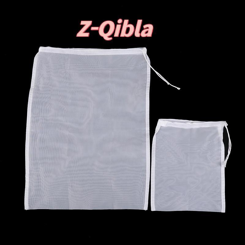 [Z-Qibla-t] ถุงกรองนมถั่วเหลือง 100 ตาข่ายถุงกรองละเอียดนํามาใช้ใหม่น้ําผลไม้กาแฟนมถั่วเหลือง เชือกรูด ถุงกรองบ้านครัวอาหาร