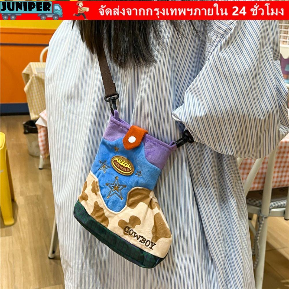 Juniper กระเป๋าสะพาย Mitch รูปทรงรองเท้า ดีไซน์เป็นตุ๊กตาการ์ตูน