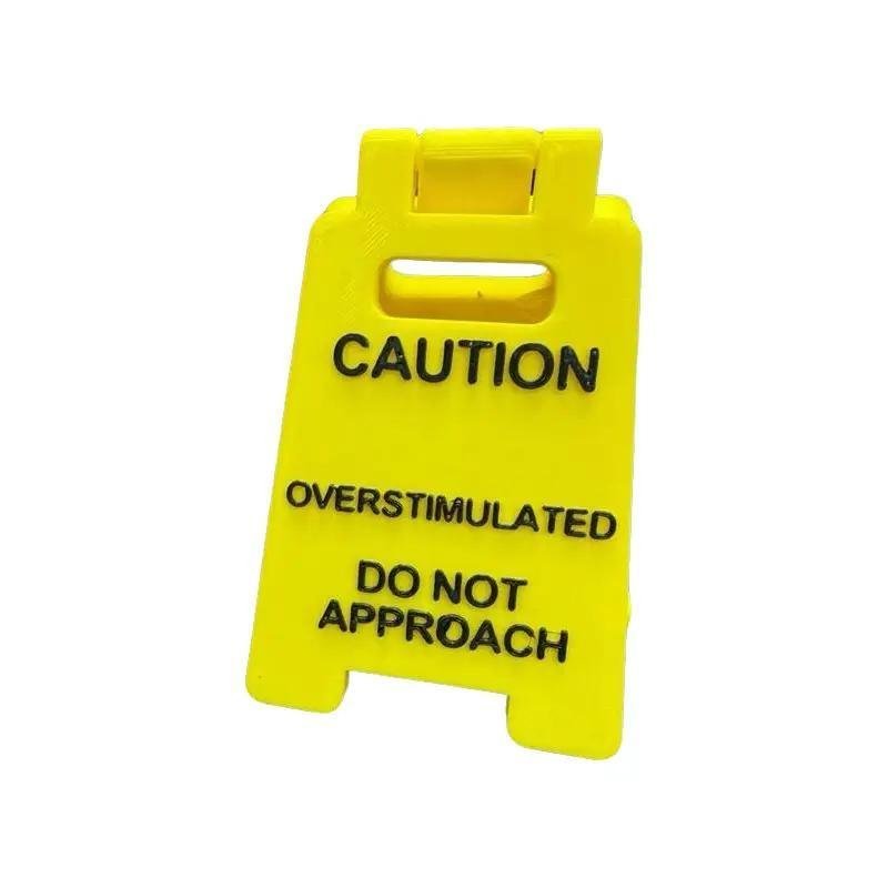 Caution Overstimulated Sign for Desk - Yellow Sign with Black Text, Warning Message for Safety Aware