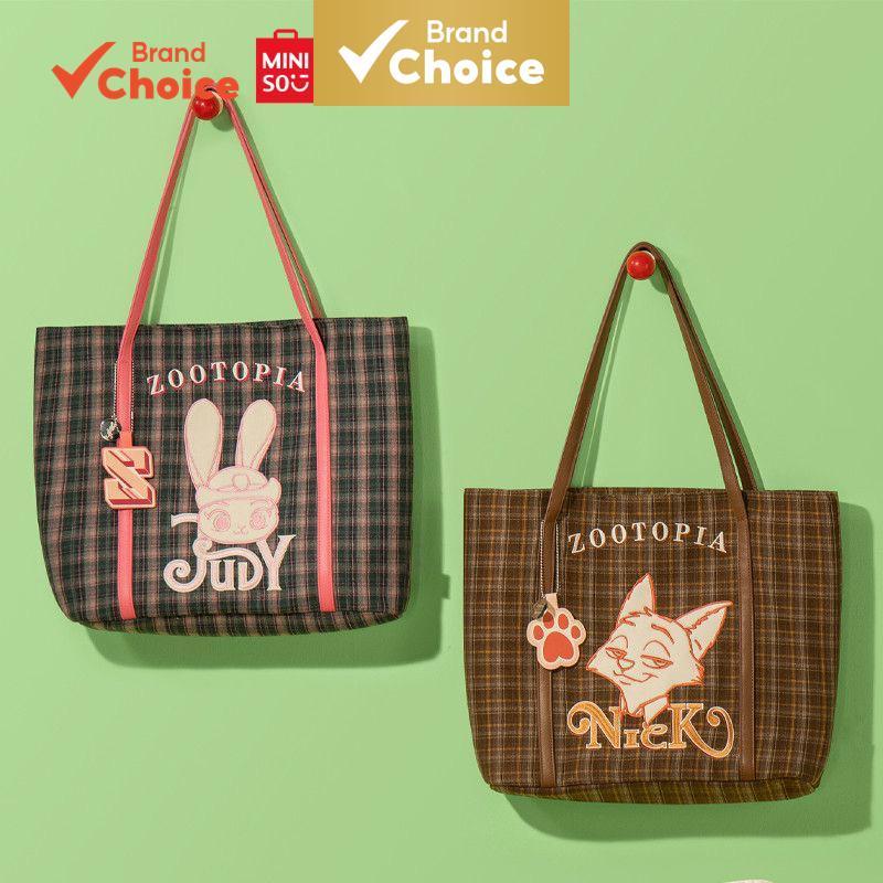 MINISO  กระเป๋า Disney Zootopia - ลายกิงแฮม & โทเต้ & ลําลอง (สไตล์นิค) ขนาด 26ซม. × 17ซม.