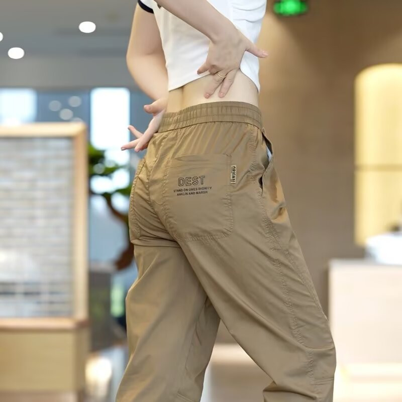 กางเกงกีฬาเอวยางยืด สไตล์เรียบง่าย สำหรับทุกโอกาส