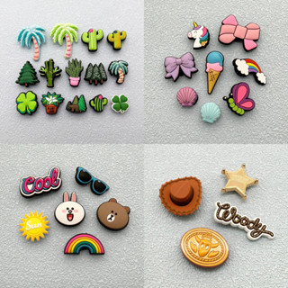 หัวเข็มขัดรองเท้าพืชสีเขียวและการ์ตูนเปลือกหอย จาก Toy Story